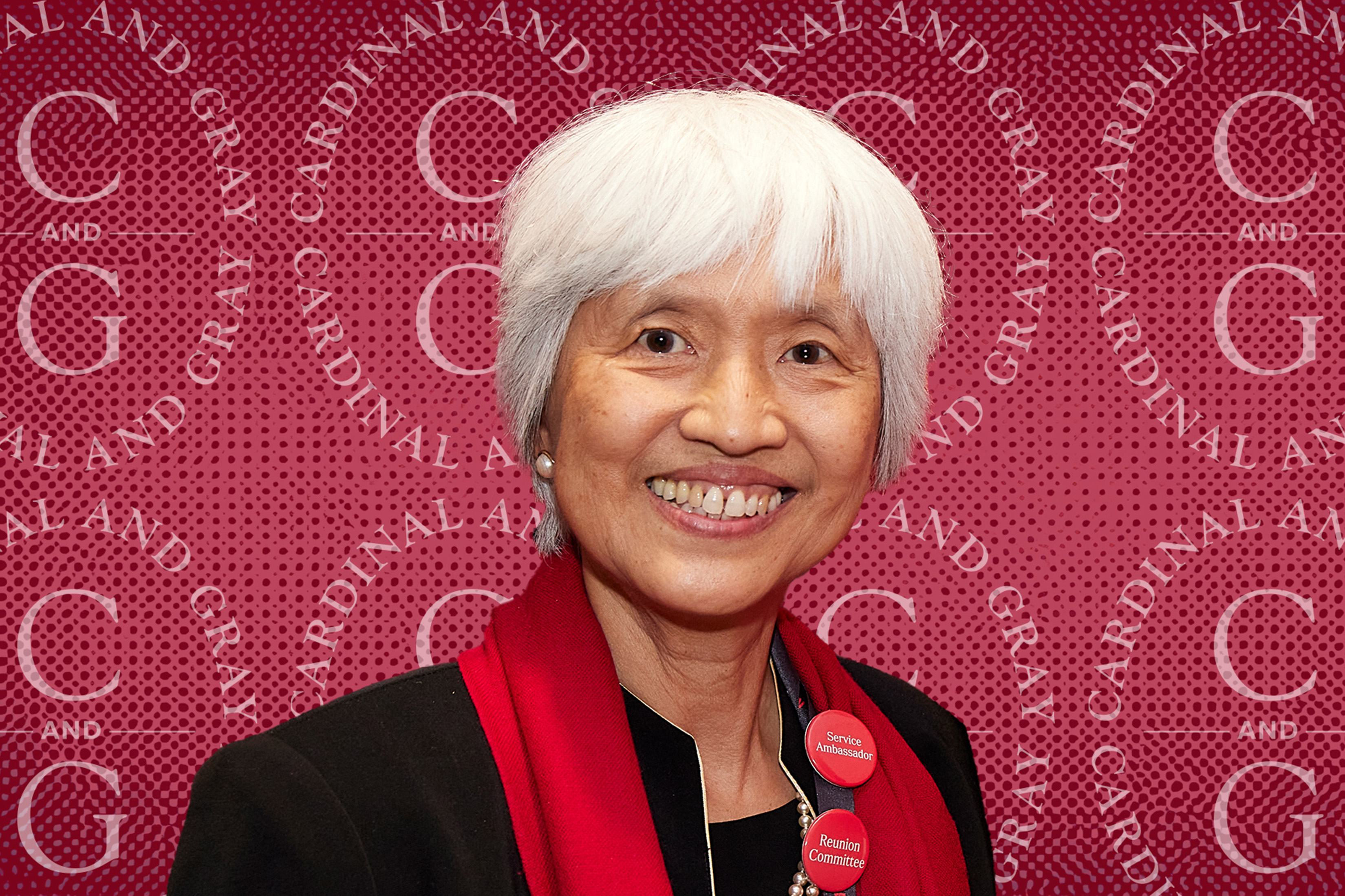 Headshot of Sze-Wen Kuo against a background showing the logo of the Cardinal & Gray Society.