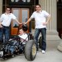 Jim Cuseo SM '05, Richard James ’04, SM ’06, and Joseph Audette ’05 with the MIT Motorsports formula-one style racecar outside the doors of Building 10